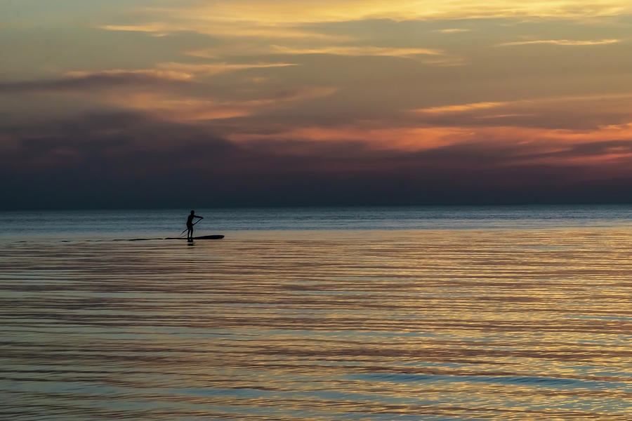 Lone stand up paddler just before sunrise Photograph by Sven Brogren