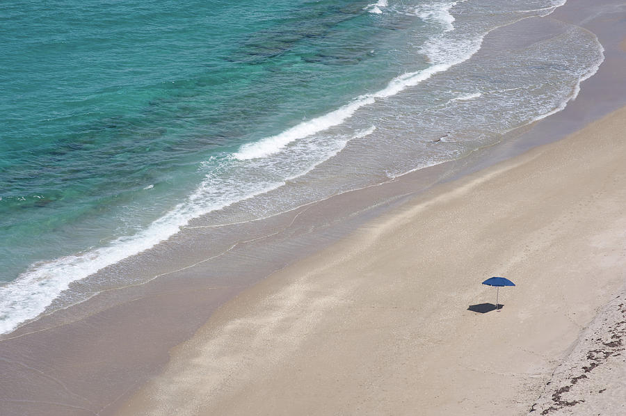 Lonely Beach In Singer Island, Florida Photograph by Juan Camilo Bernal