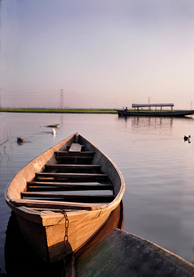 Lonely Boat Photograph by Copyright  Photobyjuthy