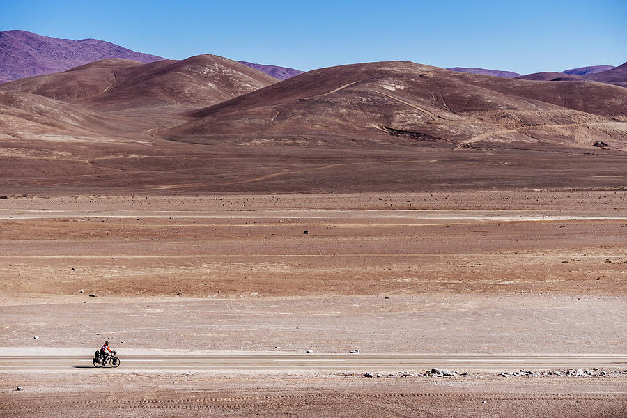 Lonely cyclist in the Atacama Desert, Chile. Photograph by Kamran Ali