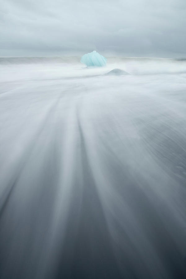 Lonely Iceberg On Icelandic Beach Photograph by Matteo Colombo