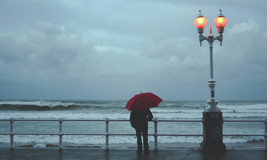 Lonely Man And A Sea Photograph by Saulgranda