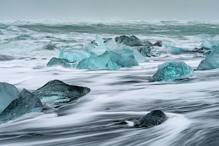 Long exposure at the Jokulsarlon ice beach Photograph by Mark Hunter