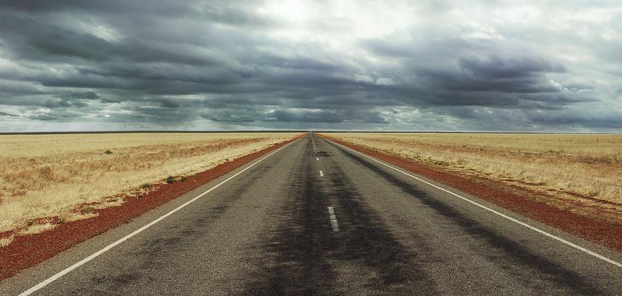 Long Straight Road On Australias Stuart Photograph by Fpm