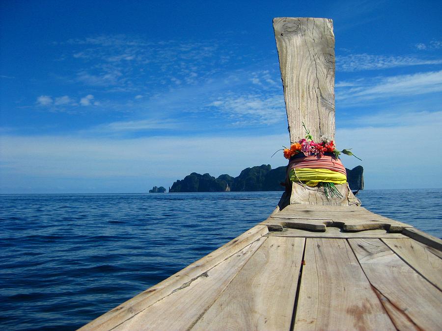 Long-tail Thai Boat Cruising To Ko Phi Photograph by Thomas Janisch