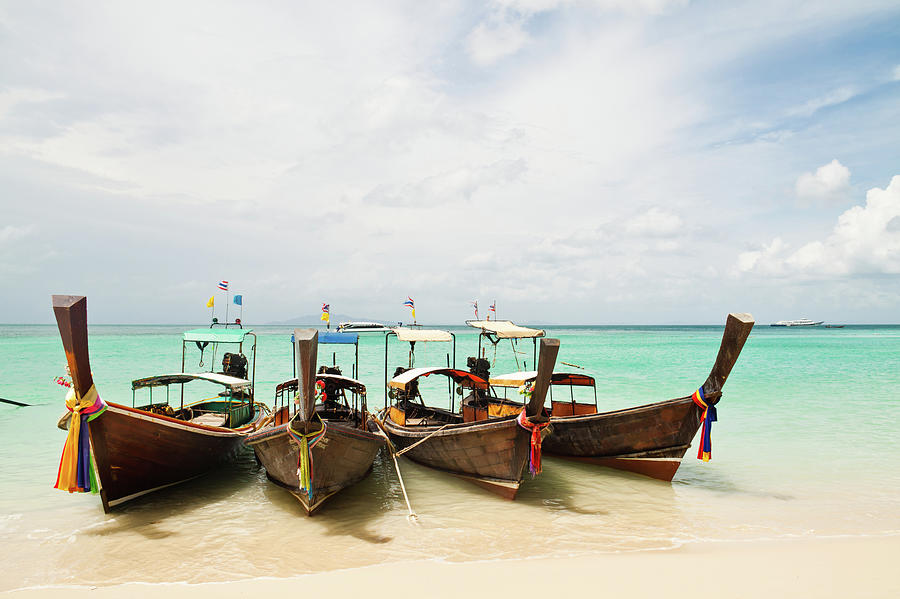 Longtail Boats At Phi Phi Island Photograph by Melissa Tse