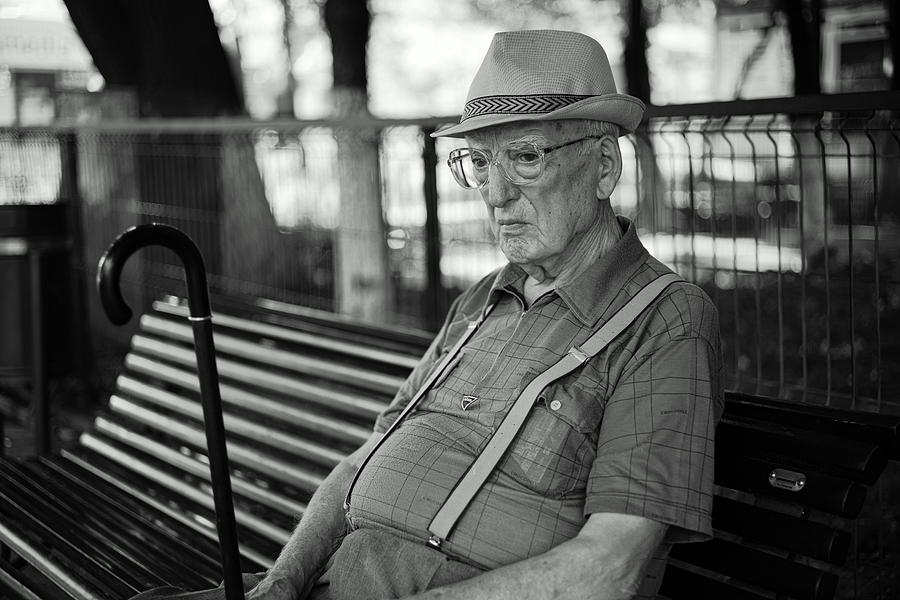 Street Photograph - Look Into A Personal Moment by Denis Malciu