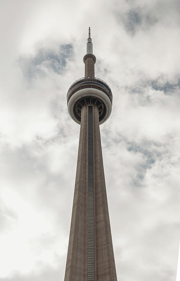 Up Movie Photograph - Looking Up At The Cn Tower In Toronto, Canada Against A Cloudy Sky. by Cavan Images
