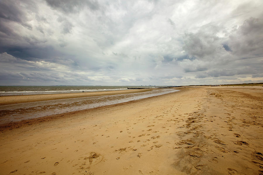 Loomy Sky Over Beach Wide Angle Shot On Photograph by Noctiluxx