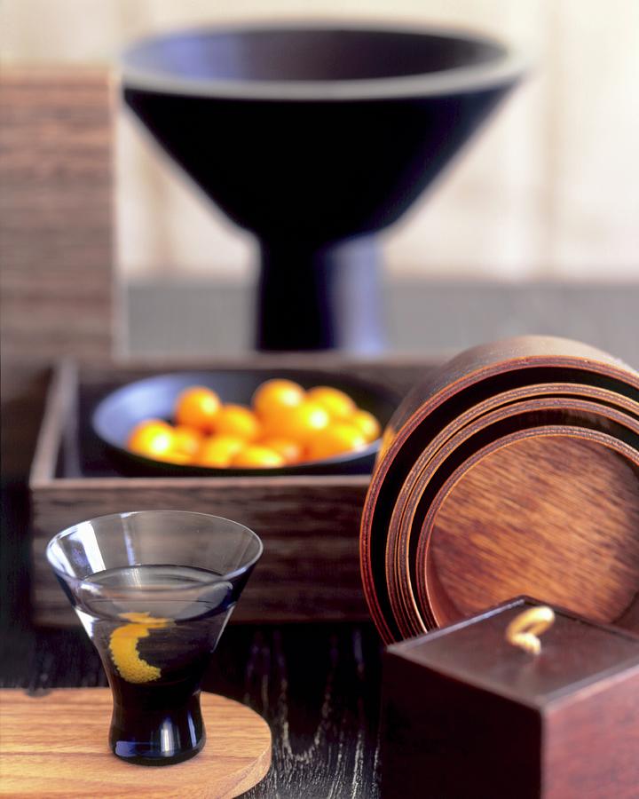 Loquat Martini With A Collection Of Japanese Wooden Bowls Photograph by Christina Schmidhofer