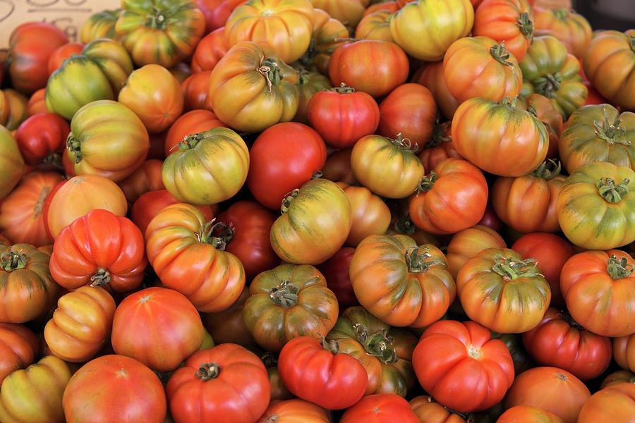 Lots Of Beefsteak Tomatoes At The Market Photograph by Dave King
