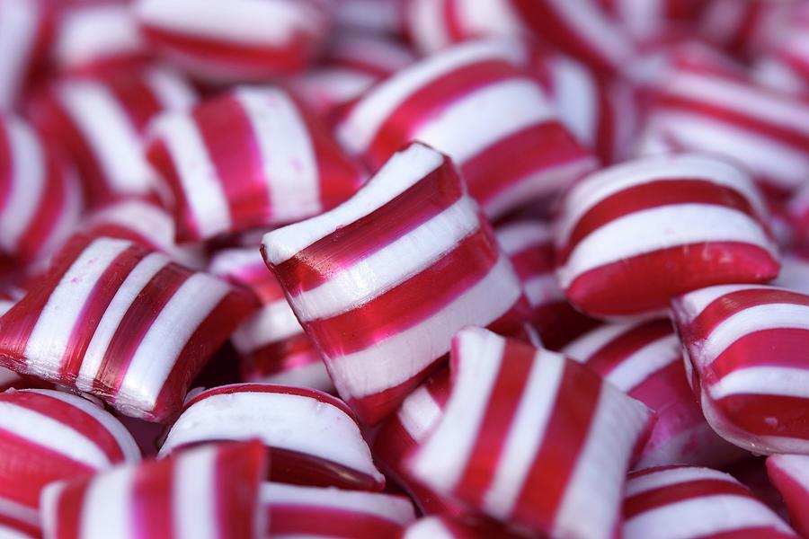 Lots Of Red And White Striped Peppermint Candies Photograph by Angelica Linnhoff