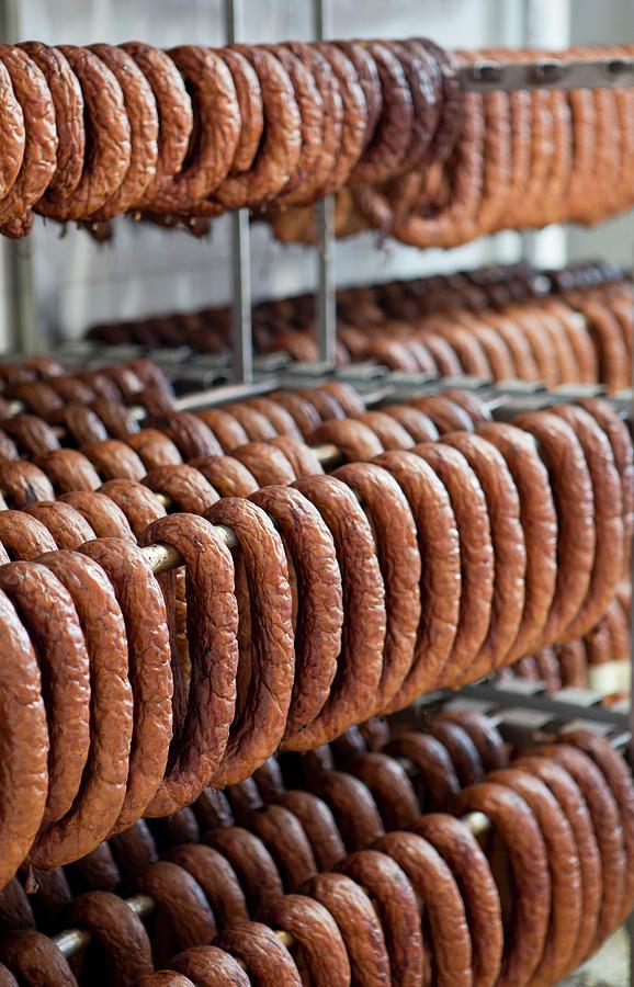 Lots Of Sausages Hanging In A Smoke House Photograph by Pawel Worytko