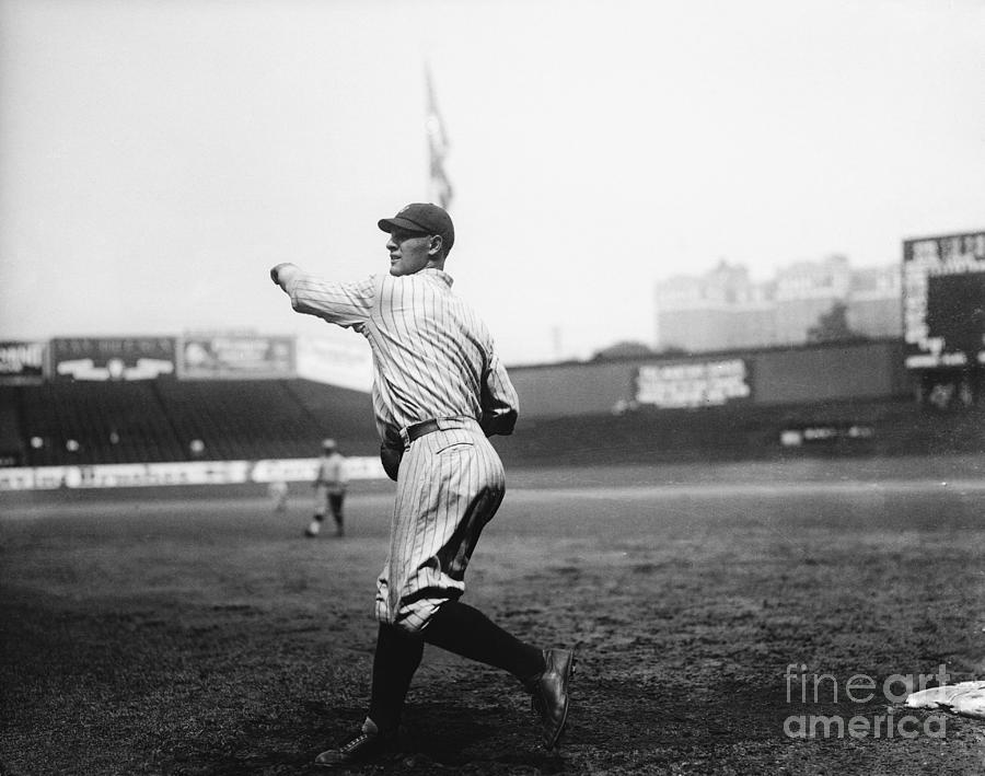Lou Gehrig Throwing Baseball Photograph by Bettmann