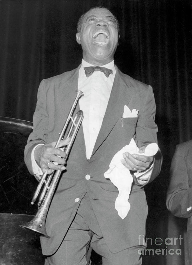 Louis Armstrong Smiling On Stage Photograph by Bettmann