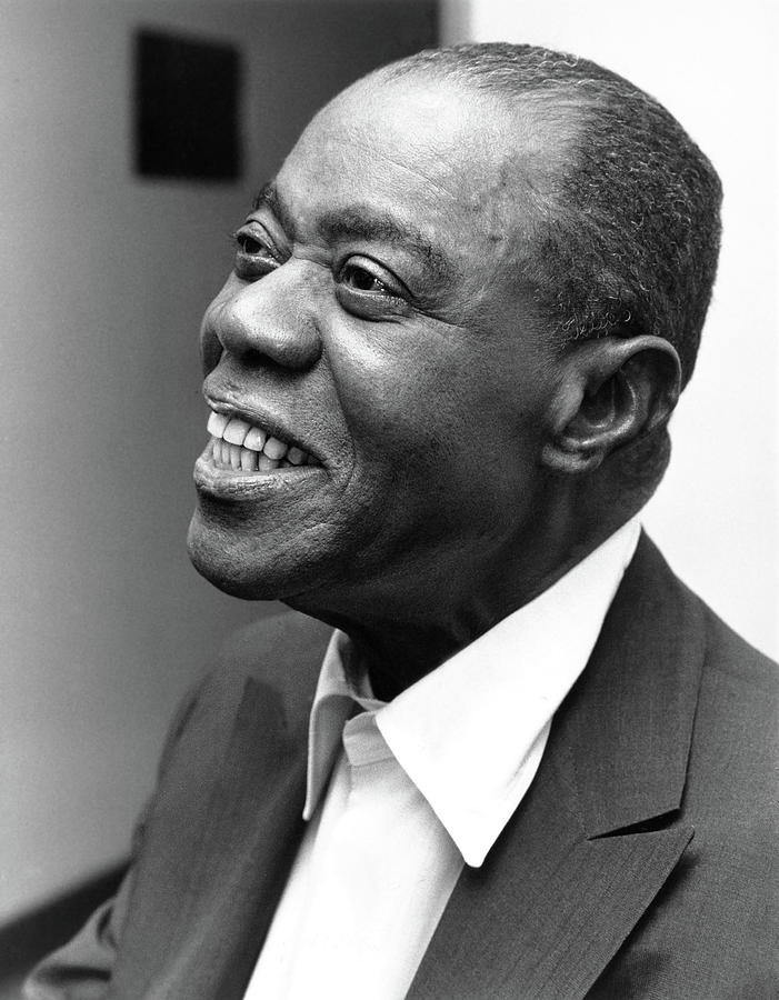 Louis Armstrong Photograph - Louis Armstrong Smiling Profile by Globe Photos