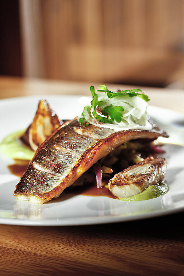 Fish Photograph - Loup De Mer With Fig And Fennel On Plate by Jalag / Markus Bassler