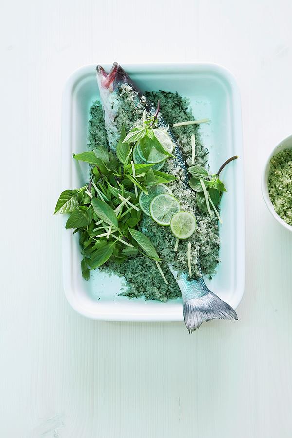 Fish Photograph - Loup De Mer With Herbs And Limes by Michael Wissing