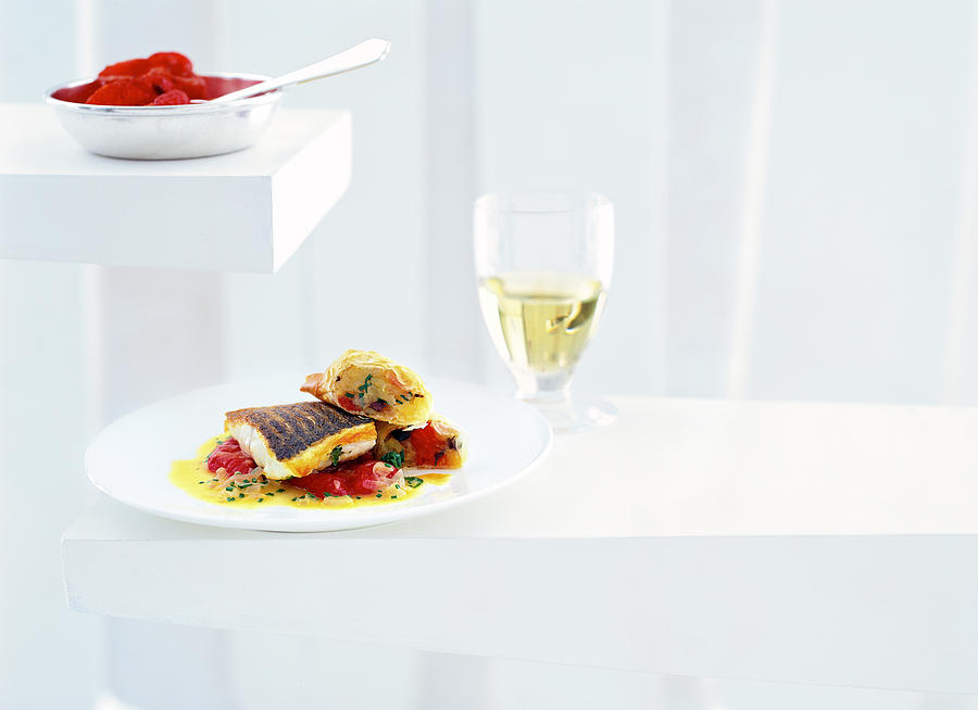 Fish Photograph - Loup De Mer With Potato Strudel And Candied Tomatoes On Plate by Jalag / Wolfgang Schardt
