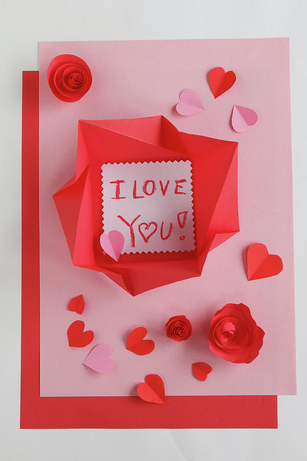 Love Note In Origami Envelope On Pink And Red Paper Photograph by ...