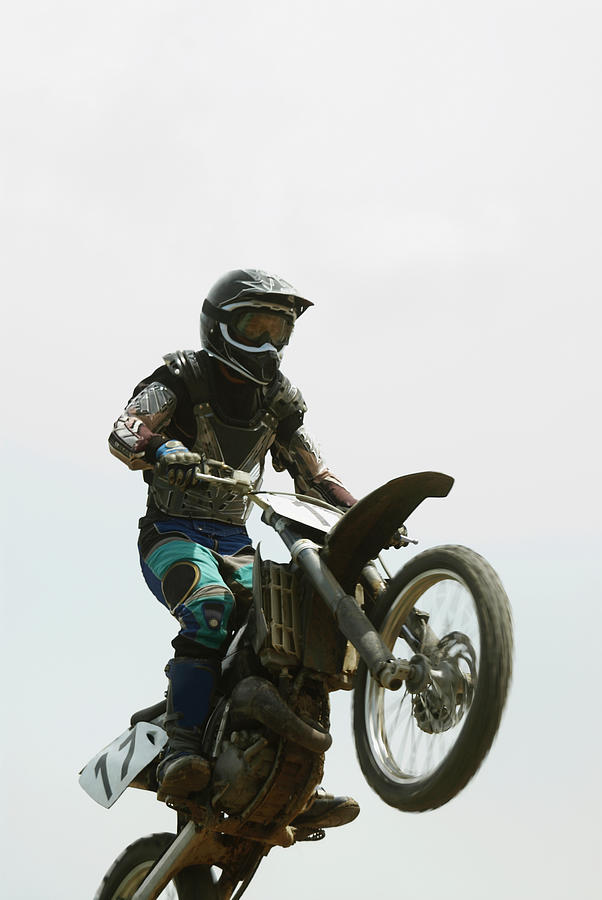 Low Angle View Of A Motocross Rider Photograph by Glowimages