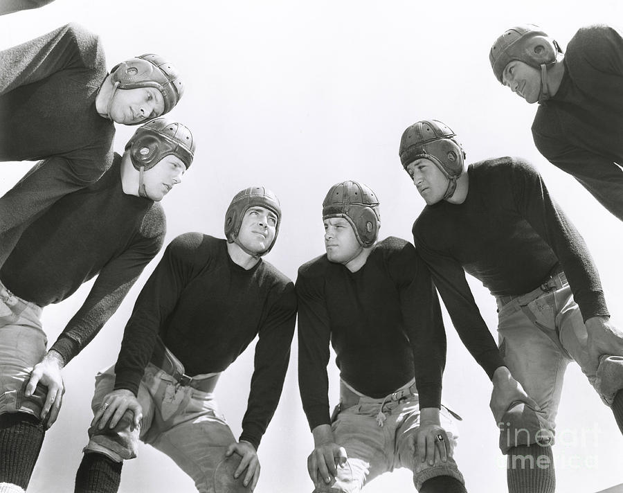 Hands Photograph - Low Angle View Of Football Huddle by Everett Collection Hands Photograph - Low Angle View Of Football Huddle by Everett Collection