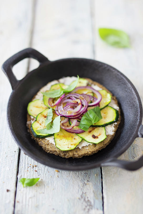 Low-carb Mini Tarte Flambe Made With A Chickpea And Sunflower Seed Dough Topped With Courgette And Red Onions Photograph by Jan Wischnewski