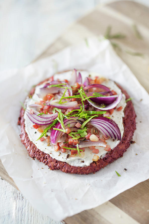 Low-carb Tart Flambe With A Beetroot And Sunflower Seed Base, Sour Cream, Bacon And Onions Photograph by Jan Wischnewski