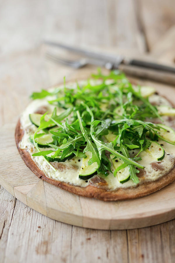 Low-carb Tarte Flambe With Courgette And Rocket Photograph by Jan Wischnewski