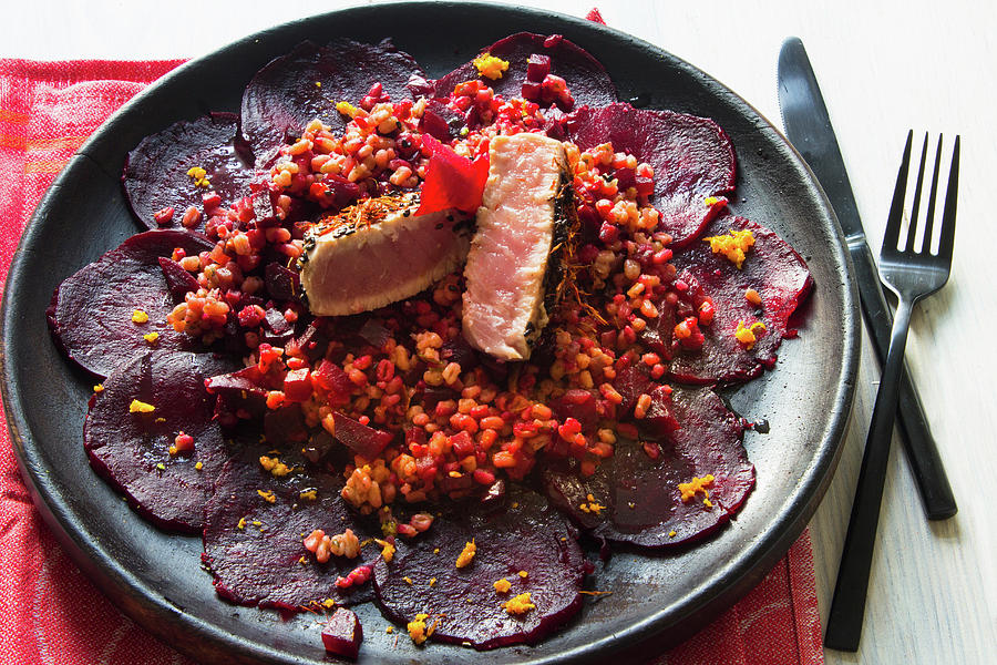 Low-carb Tuna Fish Steak With Sesame Seeds On A Beetroot Carpaccio With Bulgur Salad Photograph by Charlotte Von Elm