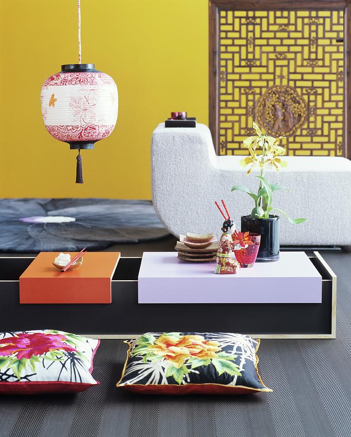 Low Oriental Table, Floor Cushions, Modern Lounger And Yellow Wall Photograph by Matteo Manduzio