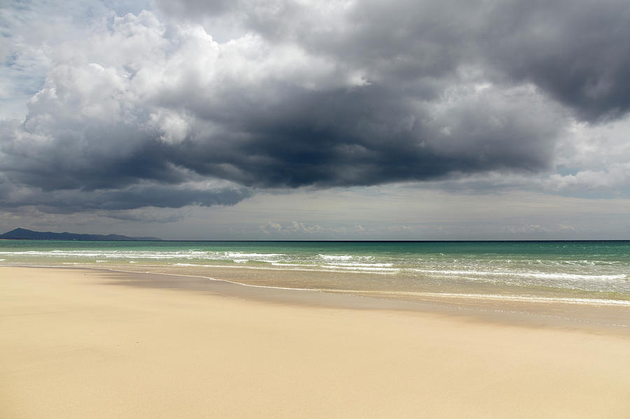 Low Storm Clouds Over Jandía Beach Photograph by Julio Lopez Saguar