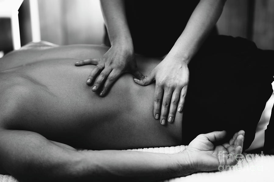 Lower back massage - Stock Image - F024/7790 - Science Photo Library