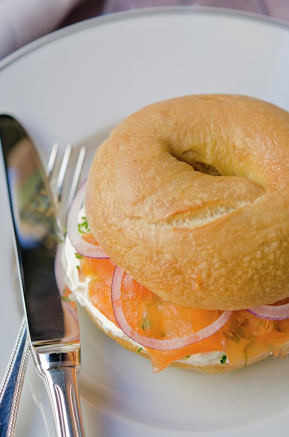 Lox And Cream Cheese Bagel Sandwich; White Background Photograph by Anthony Lanneretonne