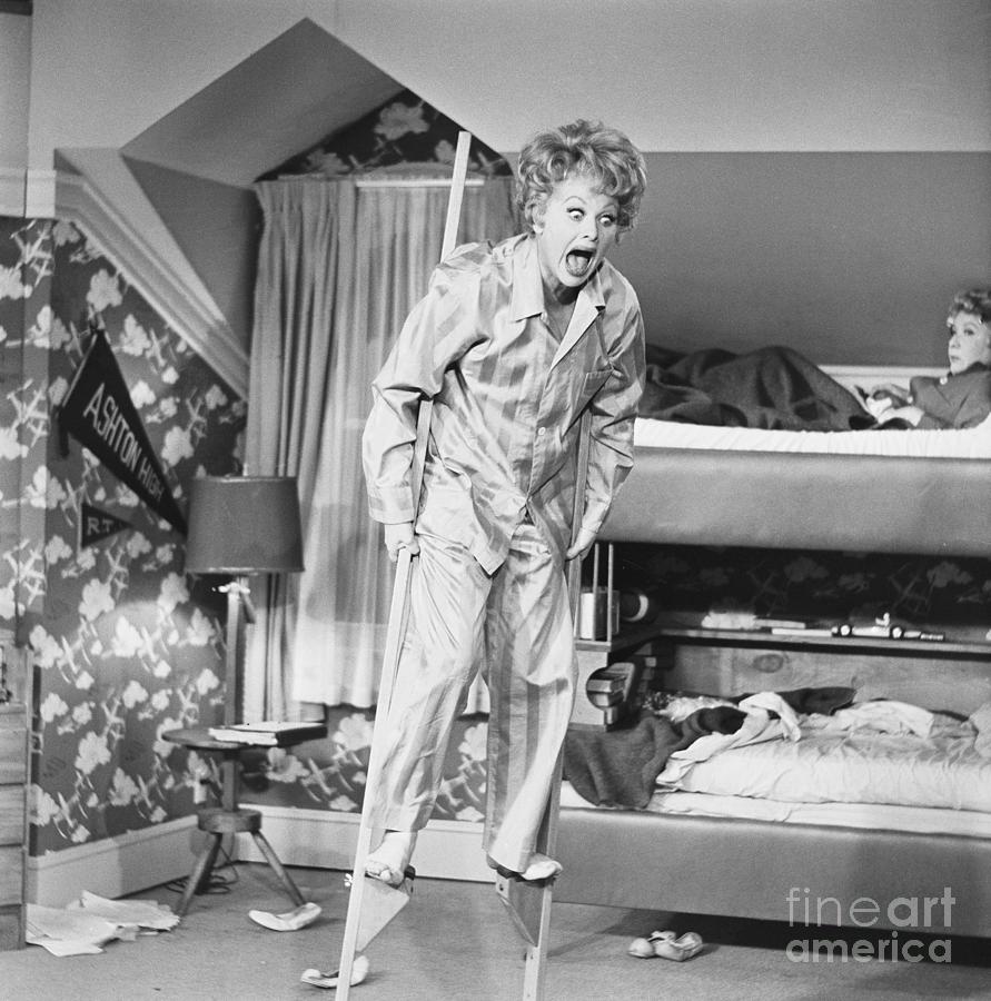 Lucille Ball Photograph - Lucille Ball Walking On Stilts by Bettmann