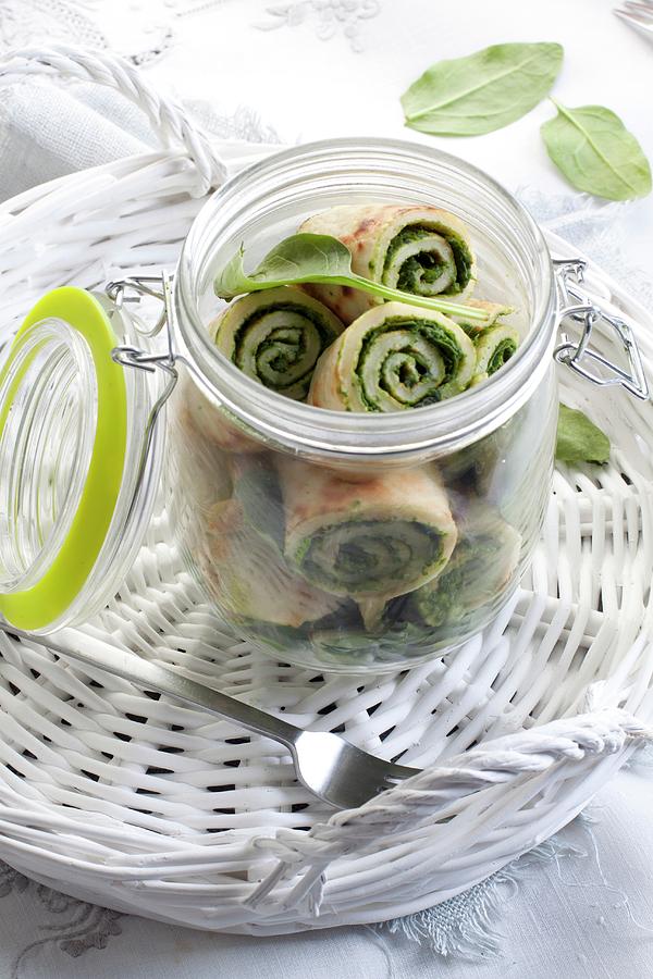 Lunch In A Jar: Pancake Rolls Filled With Spinach And Cottage Cheese In A Glass Jar Photograph by Wawrzyniak.asia