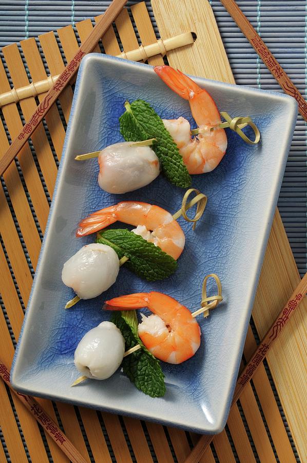 Lychee And Prawn Skewers With Mint Photograph by Jean-christophe Riou