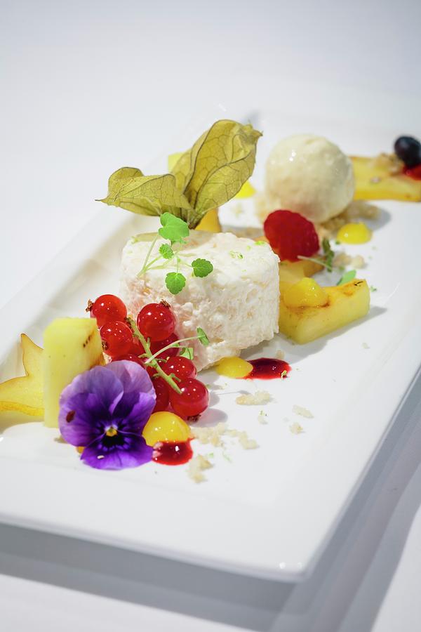 Lychee Mousse With Roasted Mango Ice Cream And Tropical Fruit Photograph by Jalag / Miquel Gonzalez