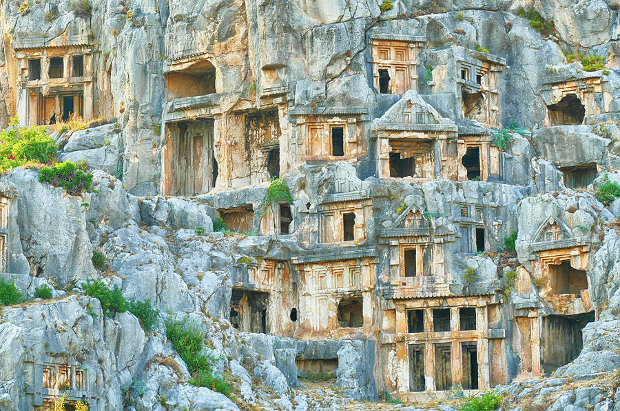Lycian rock cut tombs carved into the hillside  Photograph by Steve Estvanik