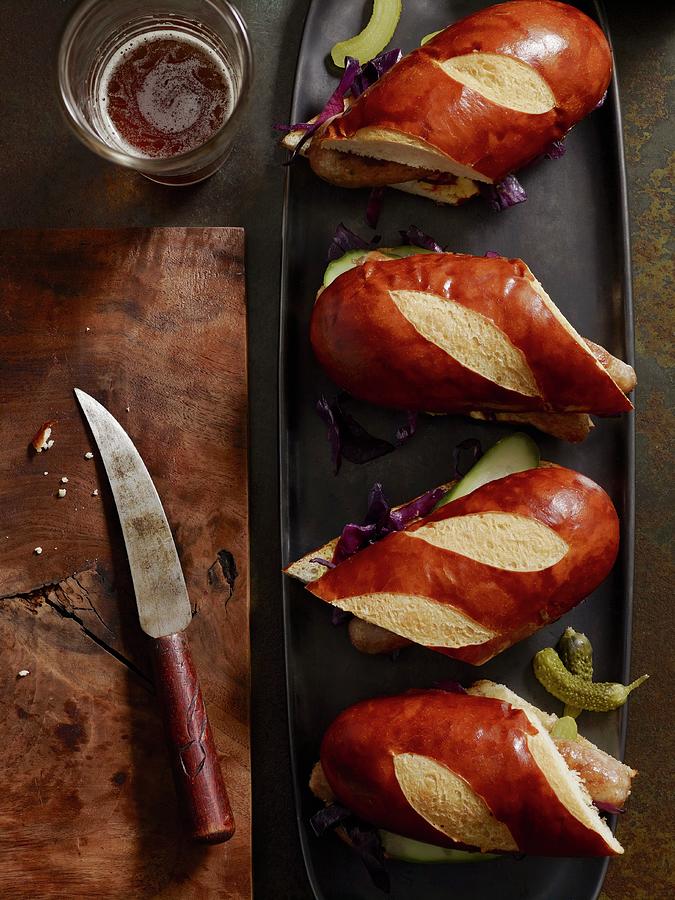 Lye Bread Rolls With Red Cabbage And Gherkins Photograph by Jim Franco Photography
