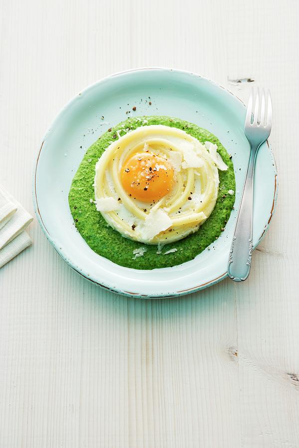 Macaroni Egg On Spinach Cream Photograph by Michael Wissing