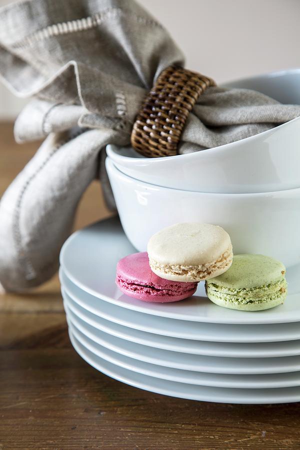 Macarons On A Stack Of Plates Photograph by Catja Vedder