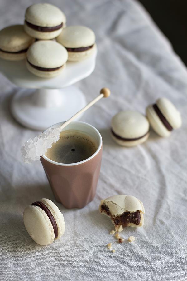 Macaroons And Coffee With A Stick Of Rock Sugar Photograph by The Kate Tin
