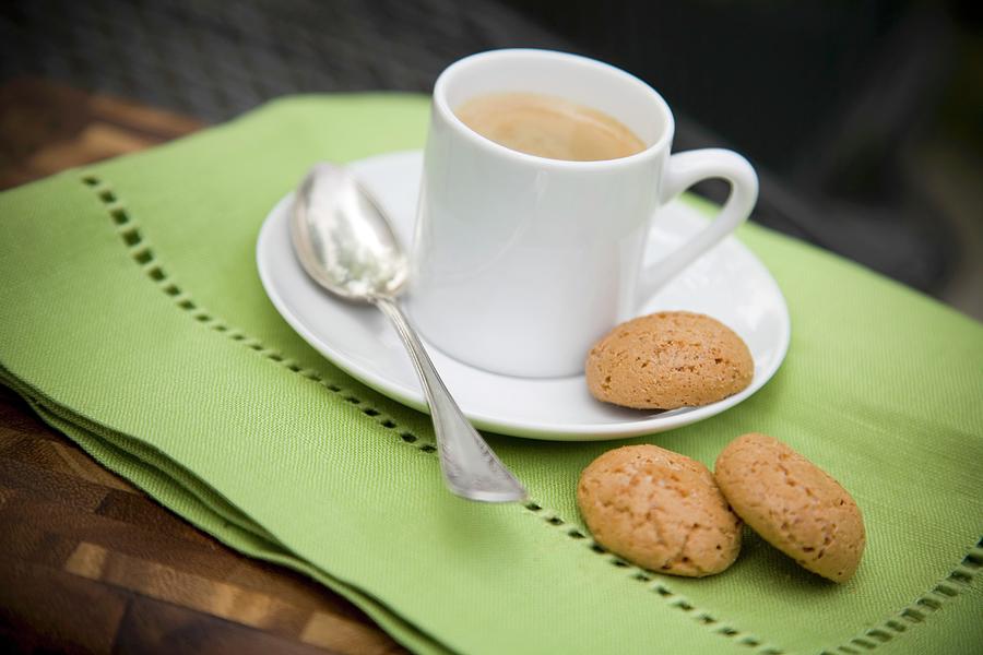 Macaroons With A Cup Of Coffee Photograph by John Gagne