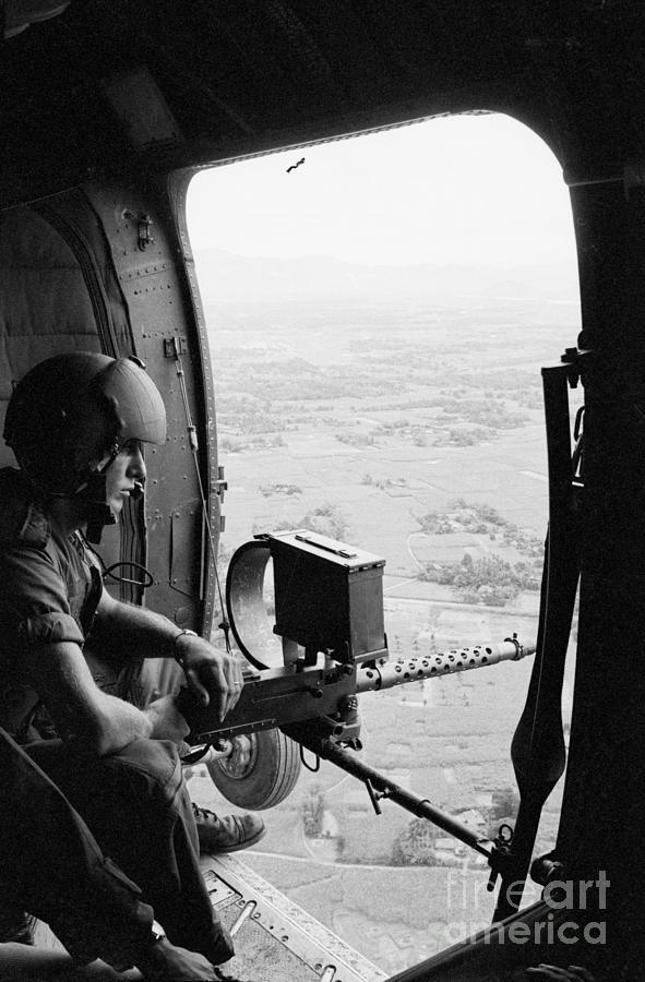 Machine Gunner In Helicopter Photograph by Bettmann