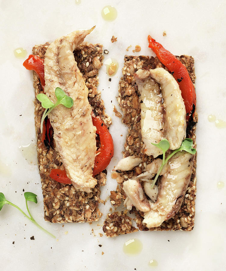 Mackerel Filets On Seed Crackers With Roasted Red Peppers And Micro Greens Photograph by Flashlight Studio