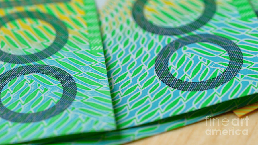 Macro closeup of Australian one hundred dollar notes. Photograph by Milleflore Images