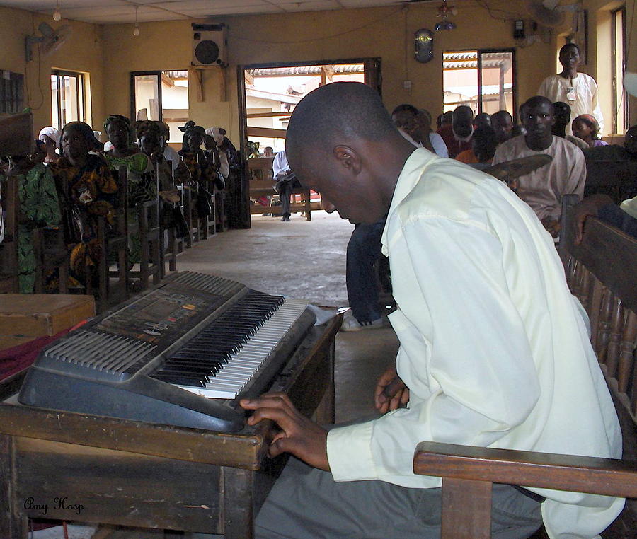 Piano Photograph - Madona Playing Piano In Nigerian Church by Amy Hosp