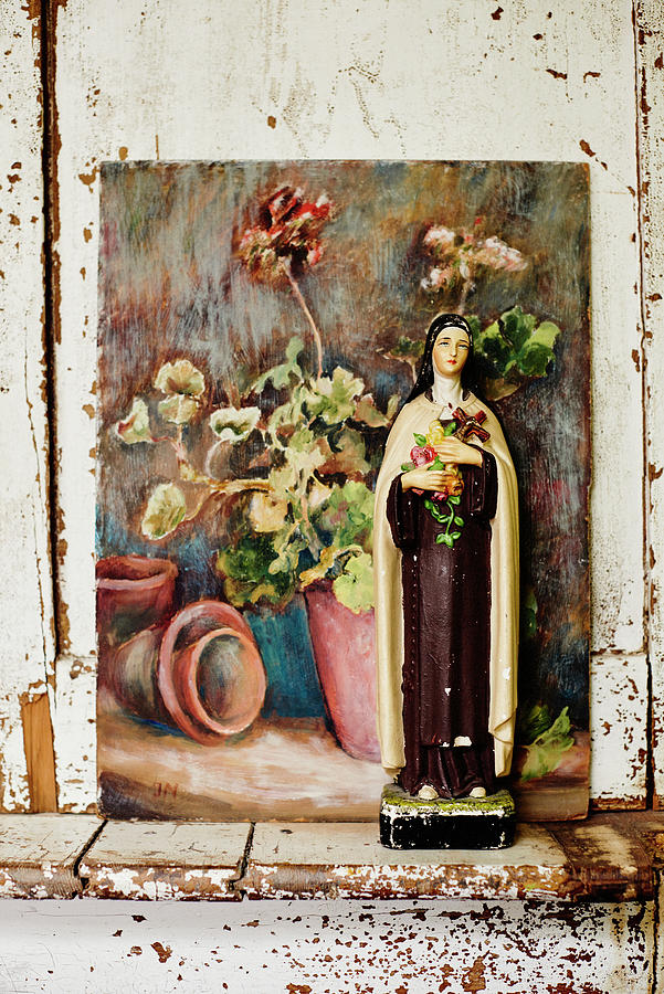 Madonna Figurine In Front Of Mediterranean Painting Photograph by Catherine Gratwicke
