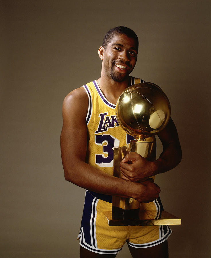 Magic Johnson Poses With Championship Photograph by Andrew D. Bernstein